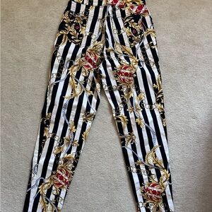 Striped Black and White Women's Pants with Gold Accents